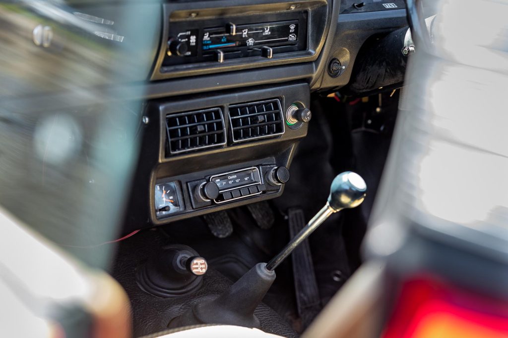 Interior view of Subaru Brumby's shifter and radio setup