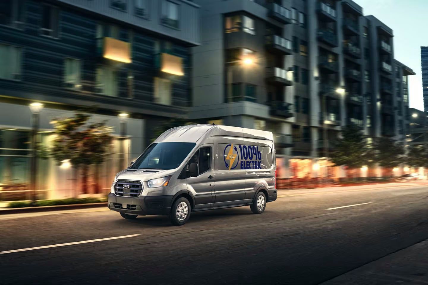 Ford E-Transit Cargo with plenty of sign writing.