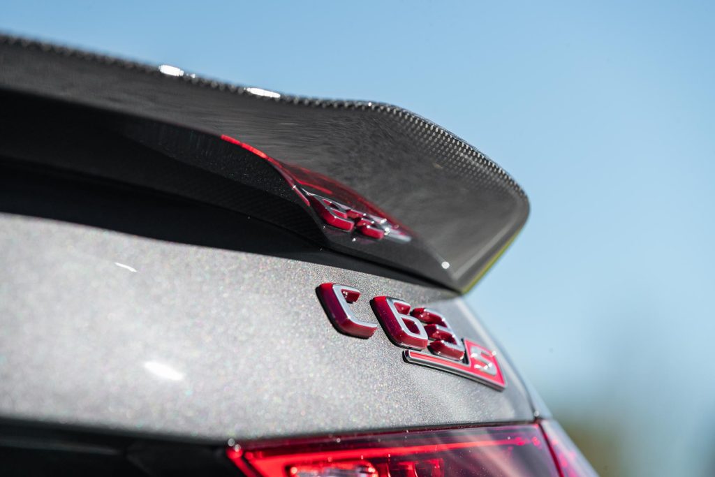 C 63 S badge detail on the Mercedes, with carbon fibre wing