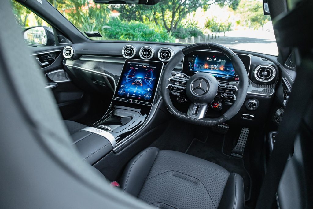 Wide interior view of the front cabin area in the 2024 Mercedes-AMG C 63 S