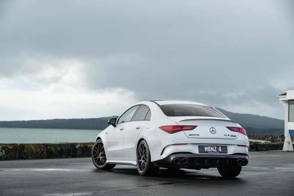 Mercedes-AMG CLA 45 S 2024 parked infront of Auckland's Rangitoto island