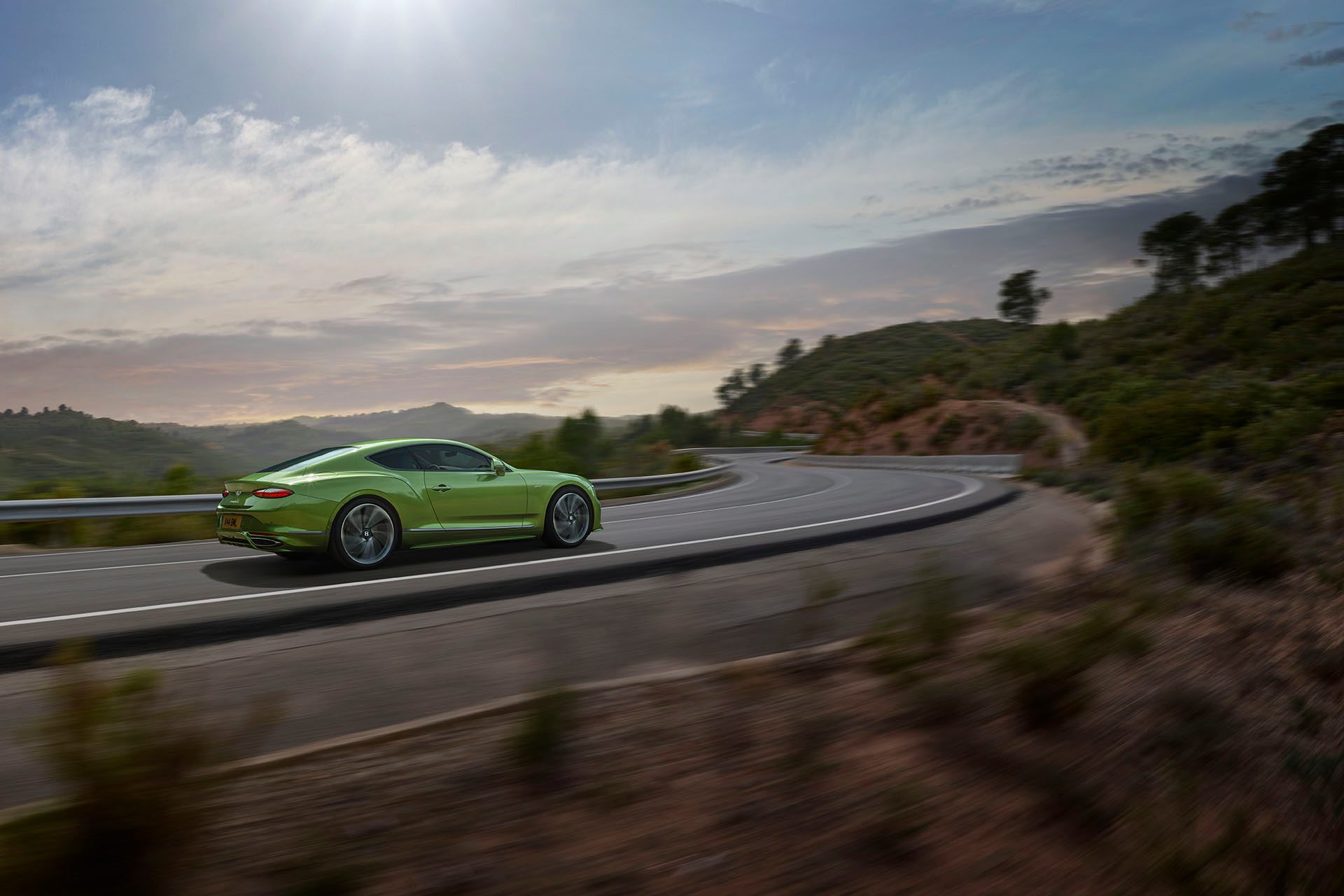 Bentley Continental GT on road, profile.