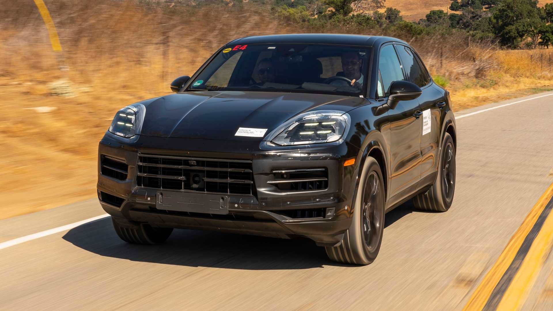 Porsche's upcoming electric Cayenne out testing on road.