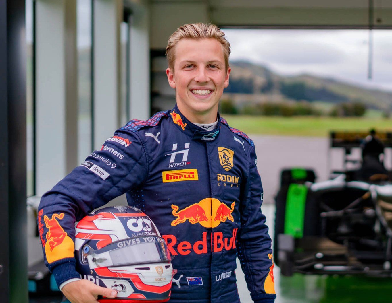 Liam Lawson all smiles ahead of next week's Red Bull F1 'promotional drive'.