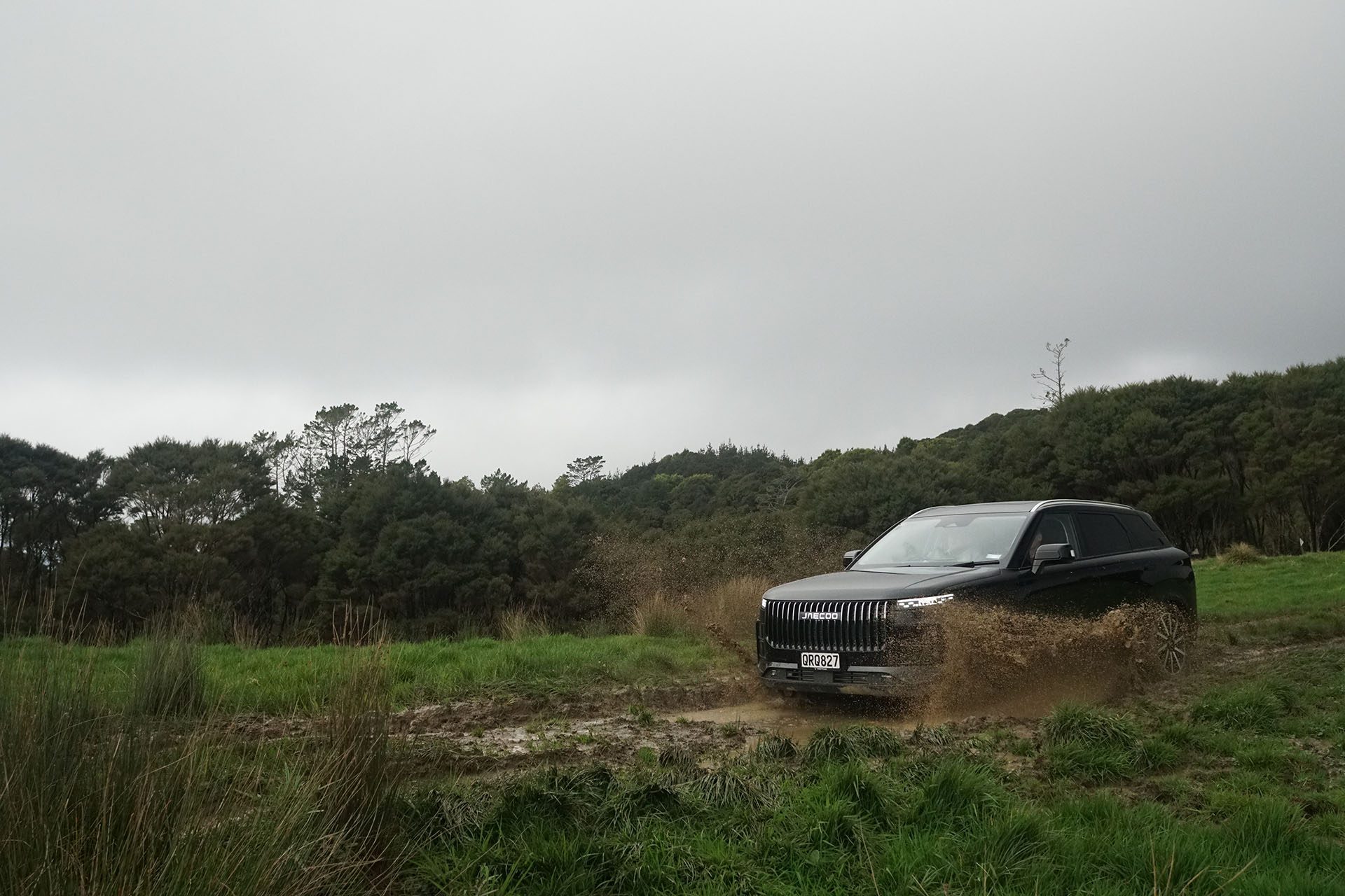 J7 enters a watersplash during the offroad drive at the official launch of the brand.