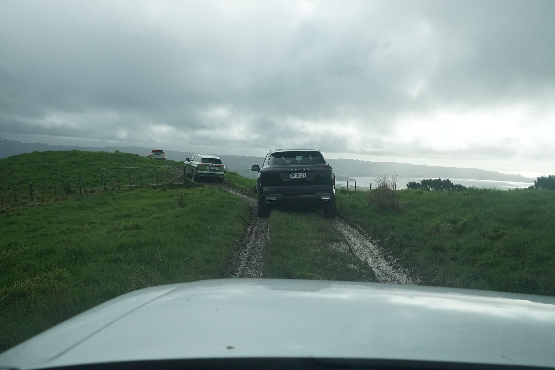 Convoy of J7 EX+ SUVs heading back down from the summit of the track.