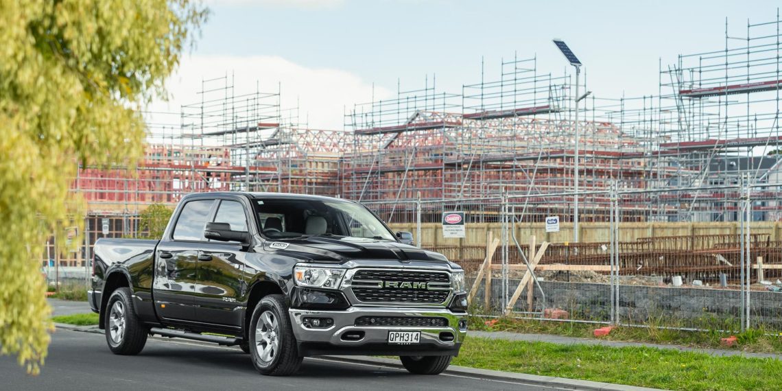 RAM 1500 Big Horn parked in front of a construction site in Auckland