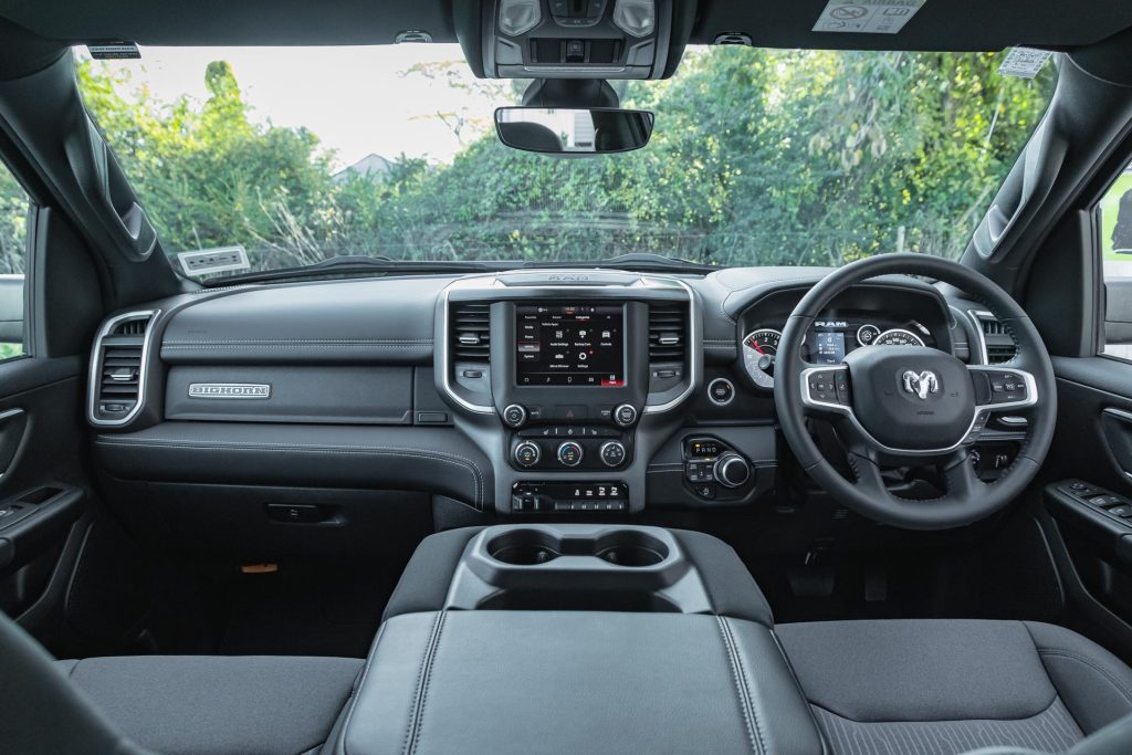 Ram 1500 Big Horn wide interior view, with central cup holders