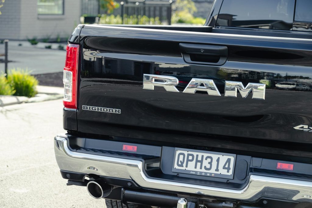 Rear tray view of the Ram 1500 Big Horn, showing badges