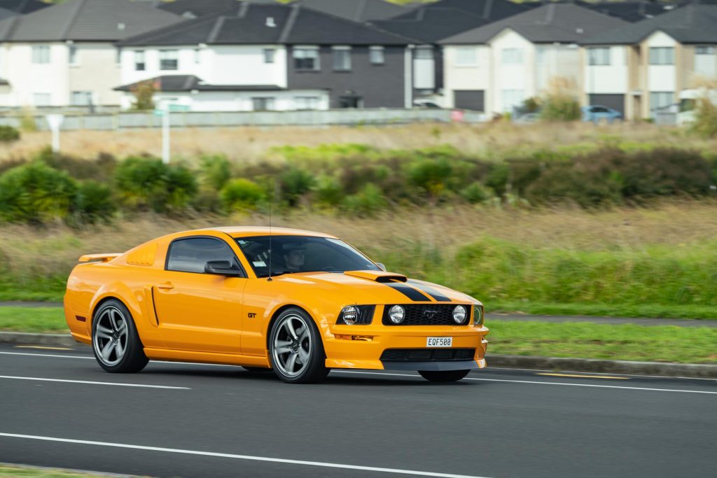 Front flyby shot of the 2007 Ford Mustang GT in yellow