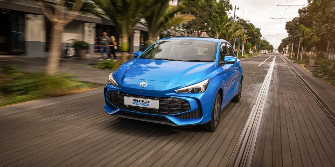 MG3 Hybrid Essence in blue, driving on NZ streets, rolling shot