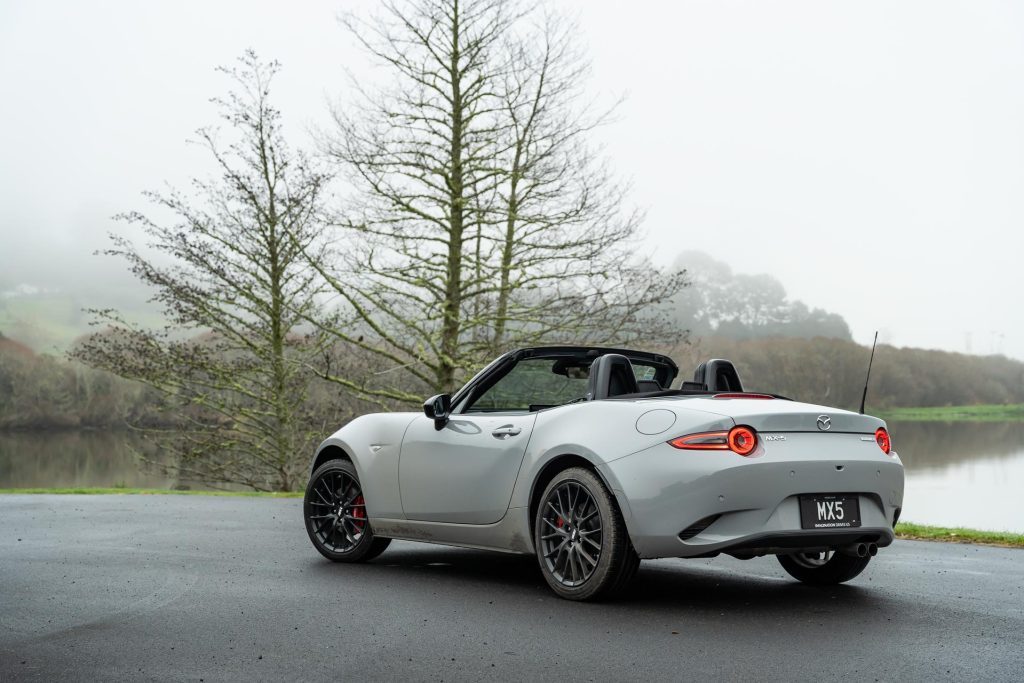 Mazda MX-5 GT in grey, parked next to the Waikato river