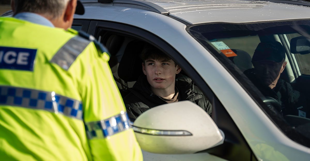 Police and young driver have a wee chat.