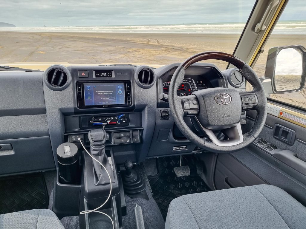 Front interior of the 2024 Toyota Land Cruiser 70 LX Wagon