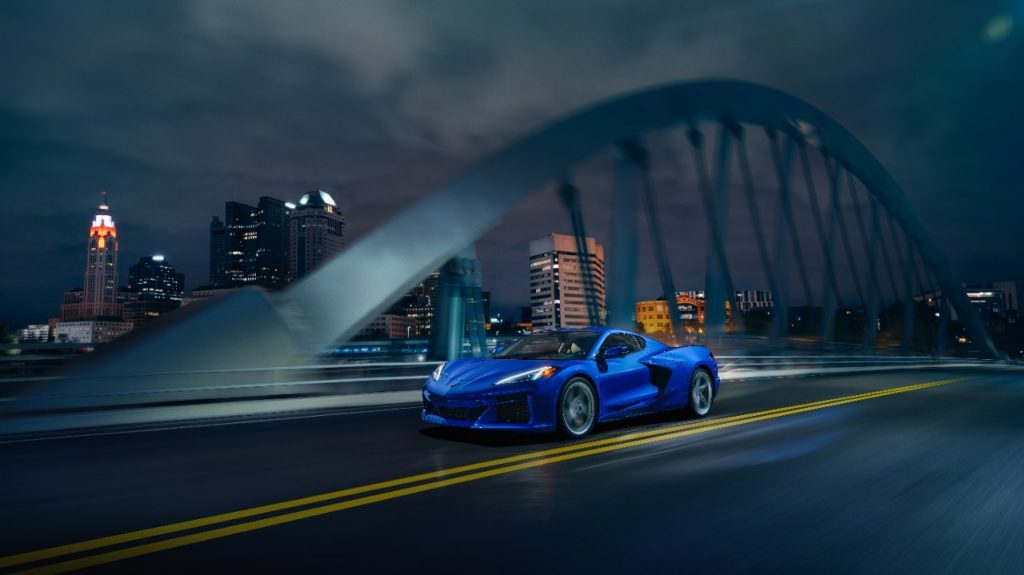 Chevrolet Corvette E-Ray on road crossing a bridge.