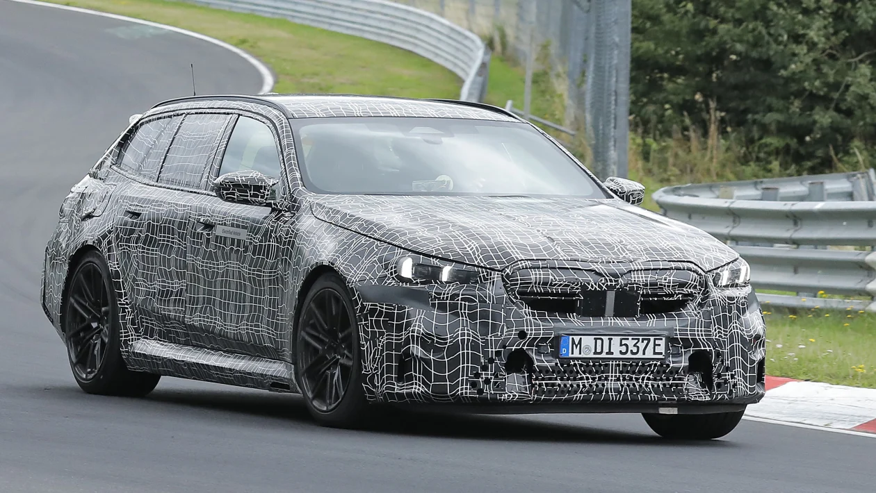 Plenty of muscle apparent beneath the camo of this BMW M5 Touring.