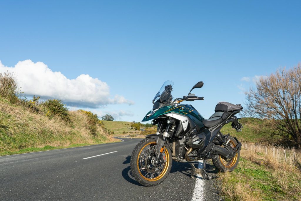 BMW R 1300s GS bike, in green parked on a winding backroad