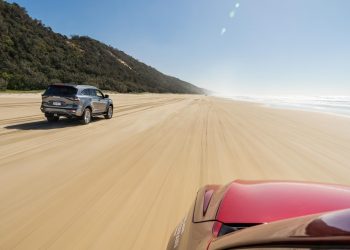 Noosa Beach drive rolling shot in Isuzu SUVs