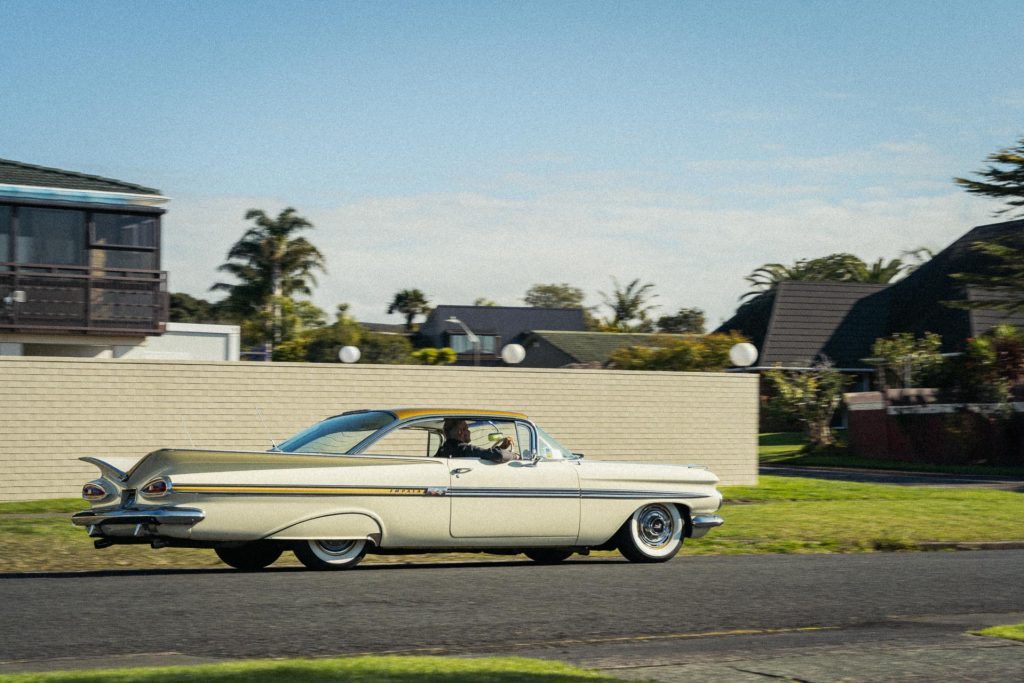 Side panning shot of the Chevrolet Impala Sport Coupe