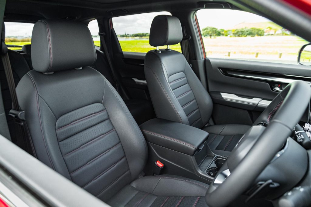 Wide view of front seats inside the 2024 Honda CR-V RS