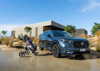 2024 Honda CR-V RS front quarter view, parked at a bach