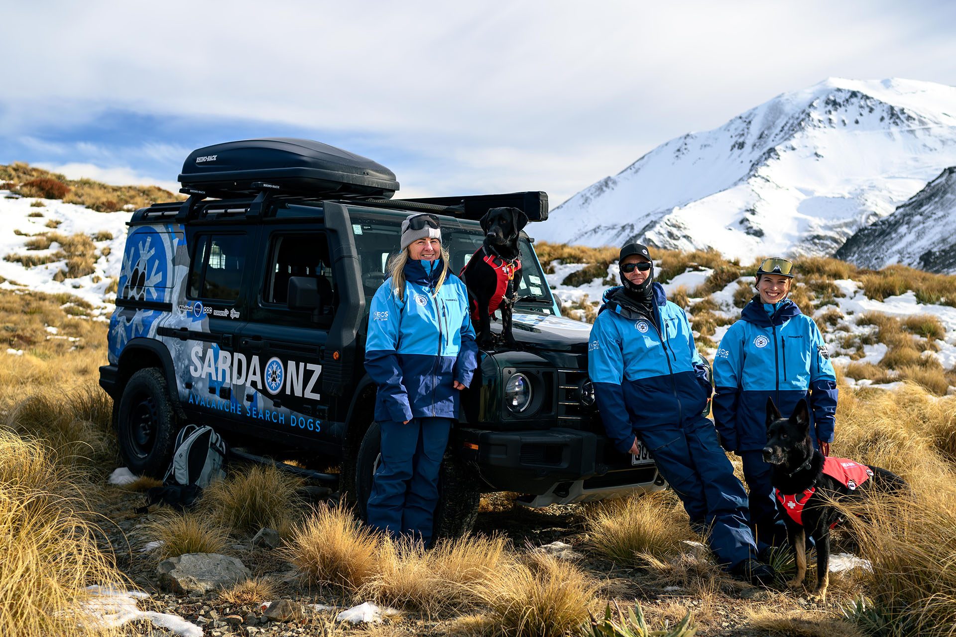 Members of the SARDA team with their purpose-built Grenadier. 