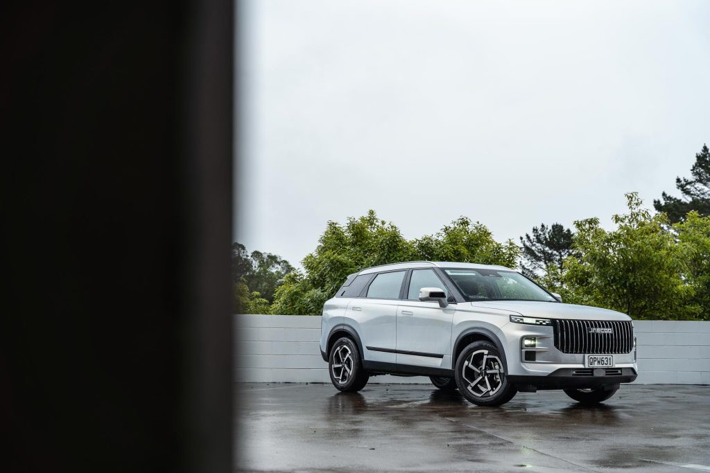 2024 Jaecoo J7 EX front quarter view, parked in the rain