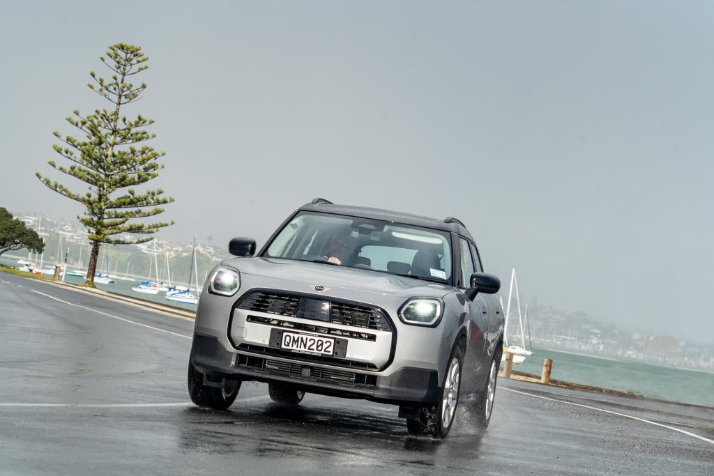 Mini Countryman Core Classic cornering in the pouring rain