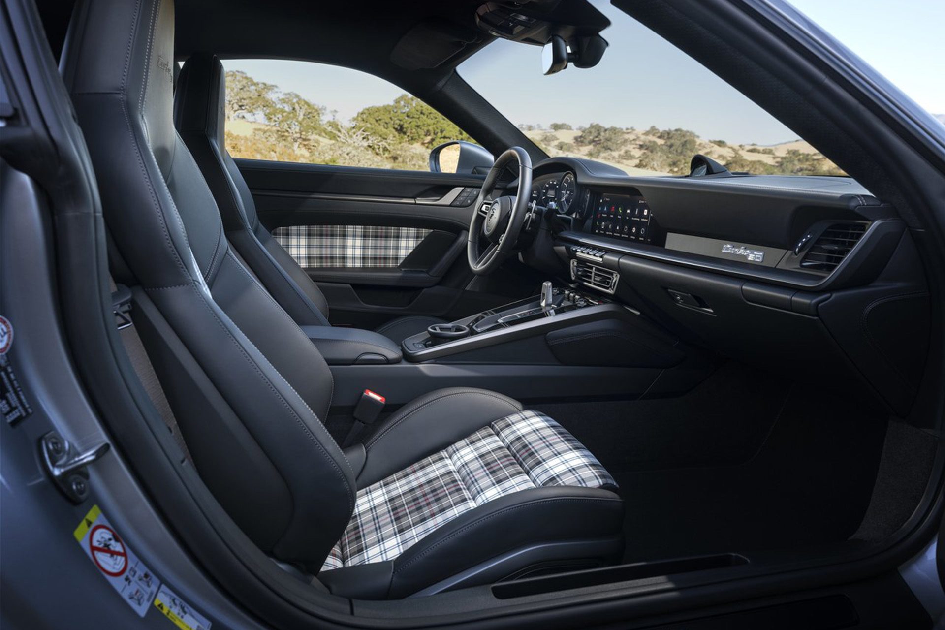 Tartan interior reminds of early 911 Turbos.