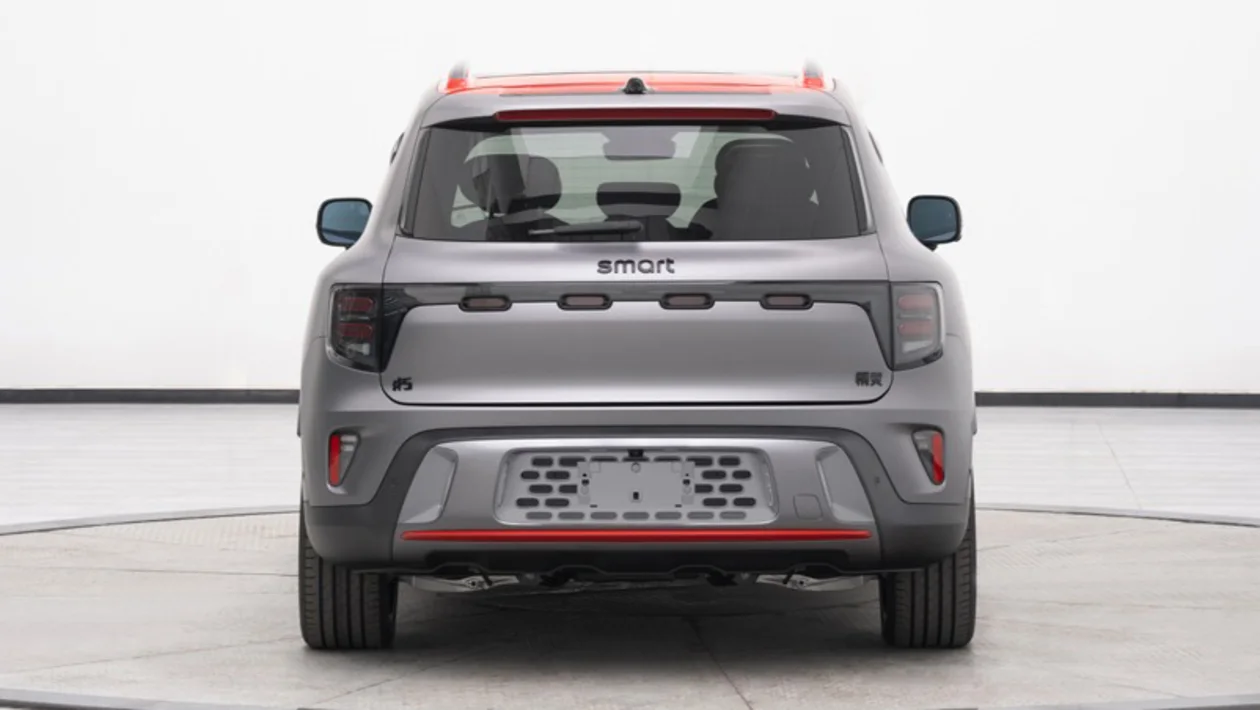 Four oblong shaped rear lights mimic the four slots up front.