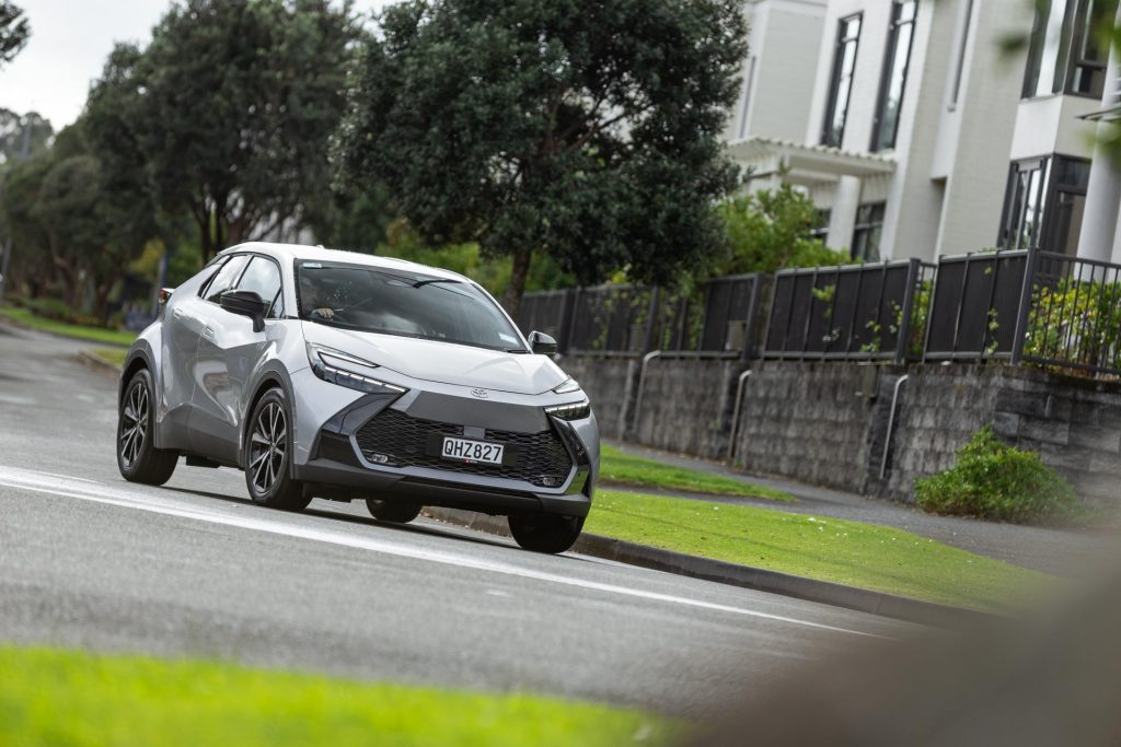 Toyota C-HR GXL Hybrid about to take a corner in a residential area