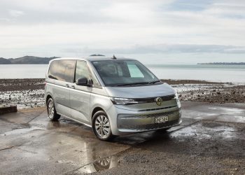 VW Multivan parked by the sea, front quarter angle