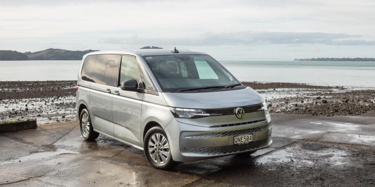 VW Multivan parked by the sea, front quarter angle