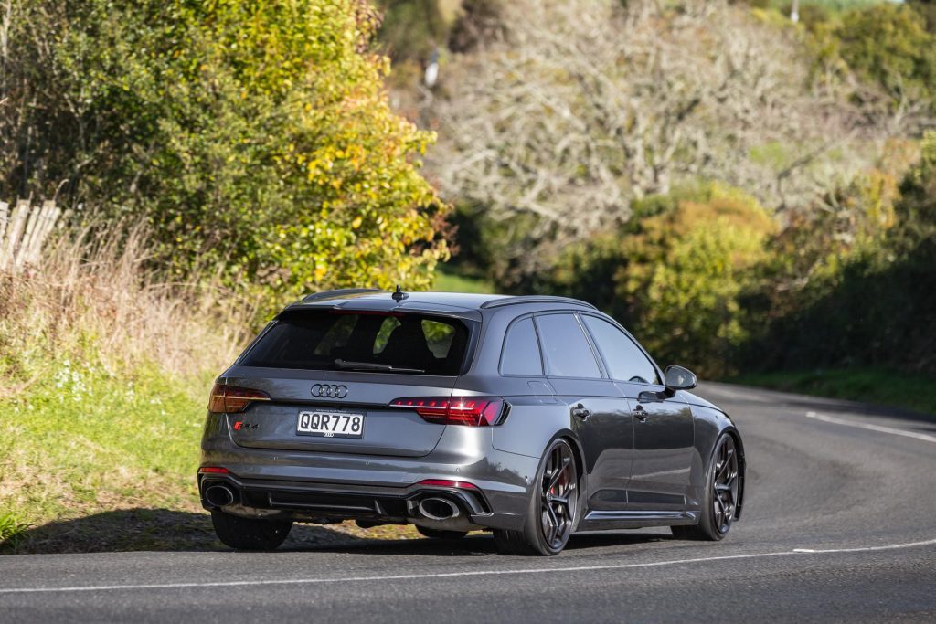 Taking a corner in the 2024 Audi RS 4 Competition Plus, on a backroad