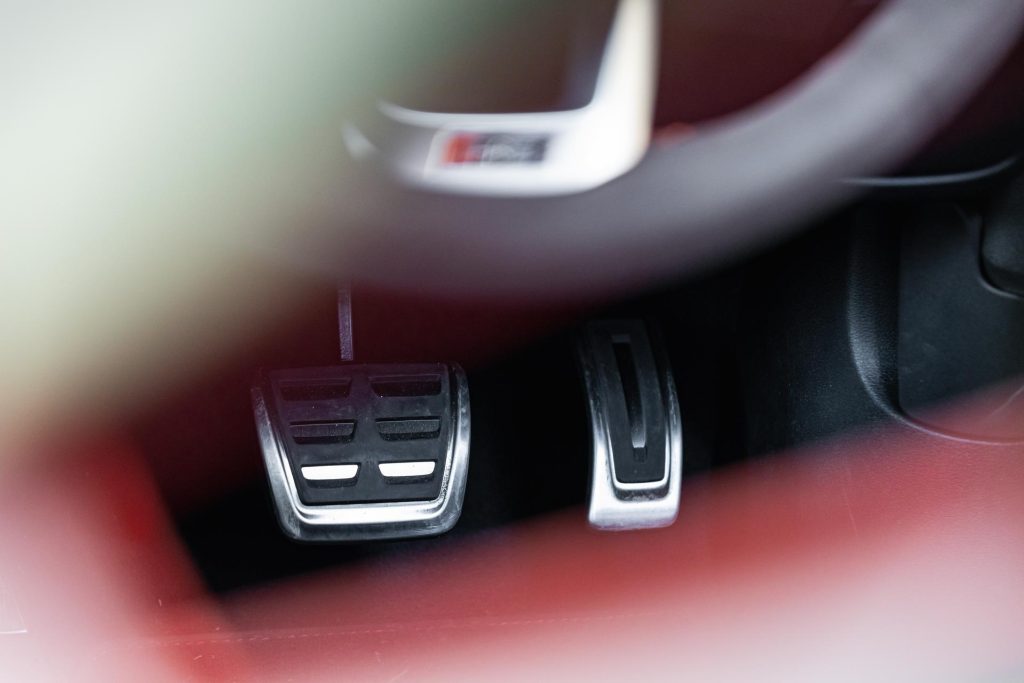 RS badge with pedals, shot through the RS 4 sports seat