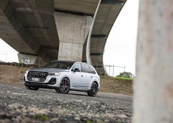 Audi SQ7 TFSI front quarter quarter hero shot parked under a bridge