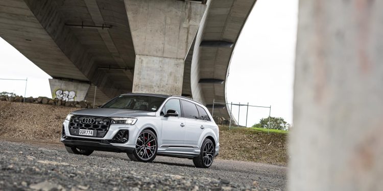 Audi SQ7 TFSI front quarter quarter hero shot parked under a bridge