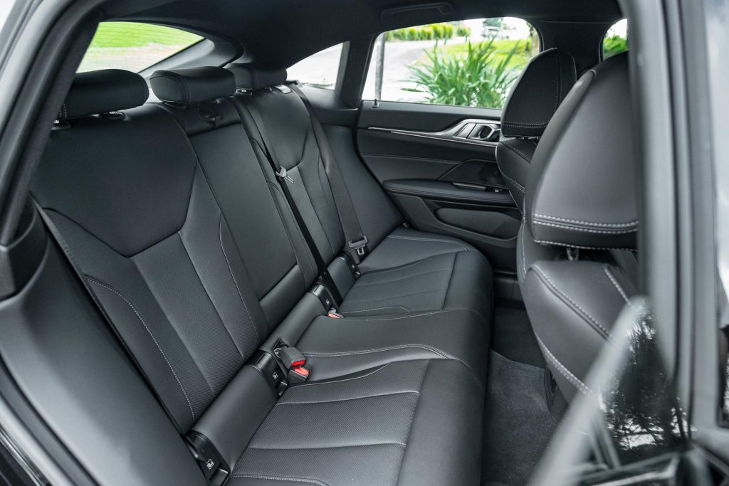 Rear seat space inside the 2024 BMW i4 eDrive35