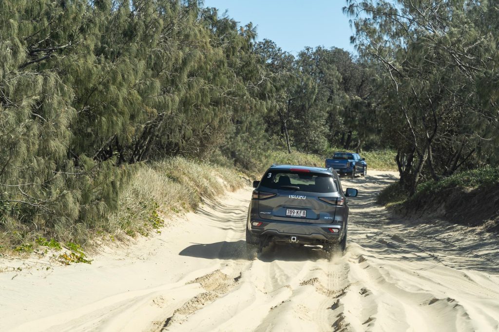 Isuzu MU-X SUV being put through soft sand