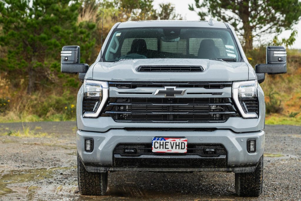 Front profile of the 2024 Chevrolet Silverado 2500 showing extremely wide mirrors