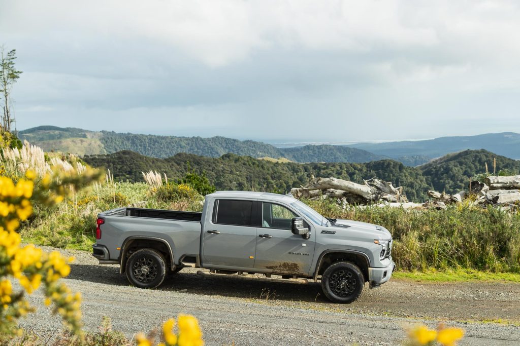 Side profile of the 2024 Chevrolet Silverado 2500 HD LTZ Premium, on a hill