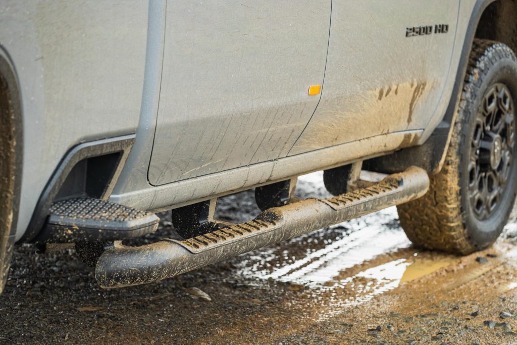 Silverado 2024 side step detail, covered in mud