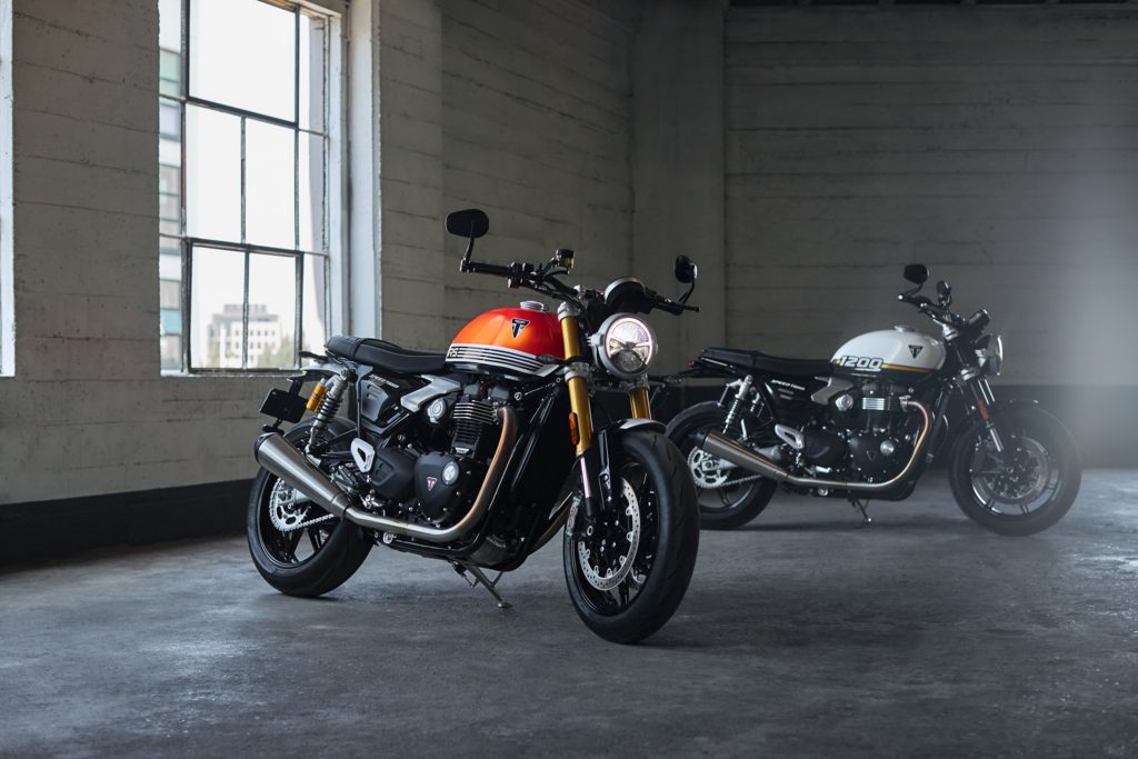 The pair of new Triumph 1200 Speed Twins in a warehouse.