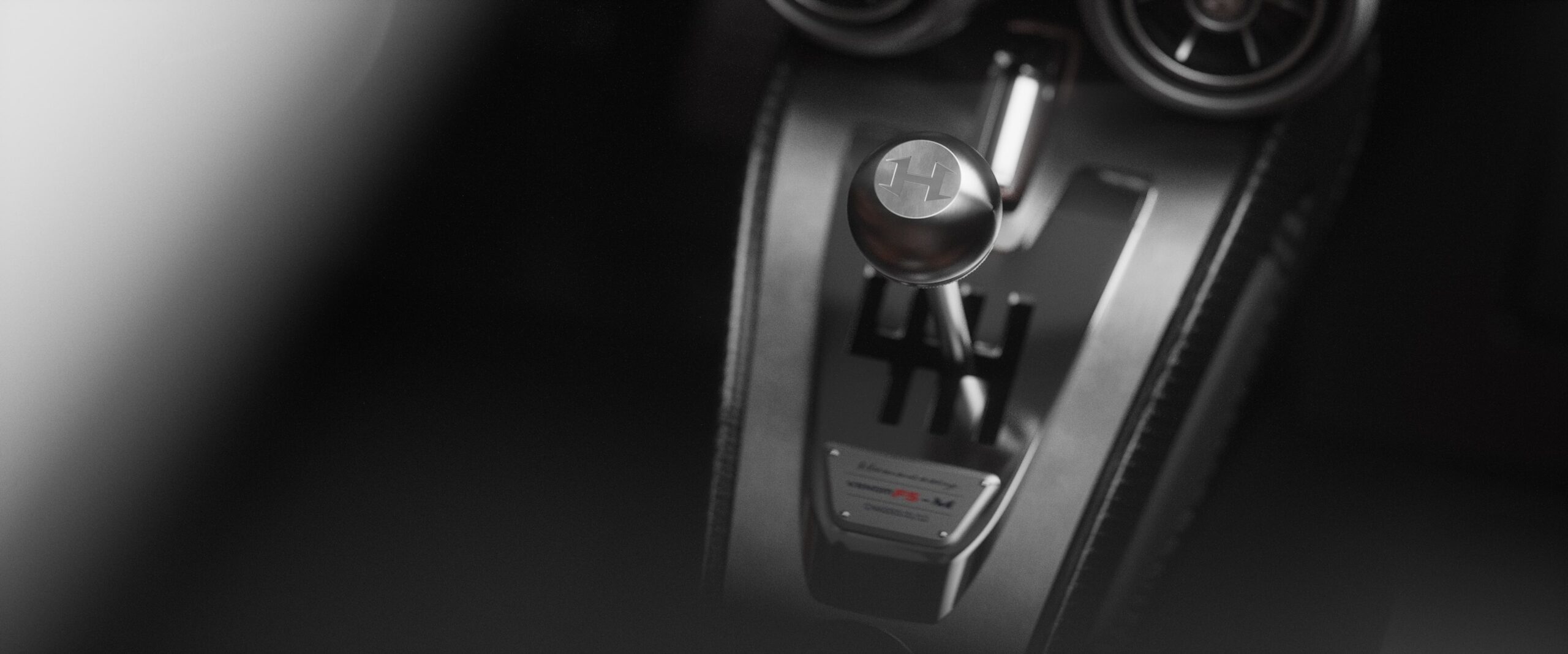 And here it is, the carbon shifter for the six-speed manual trans.