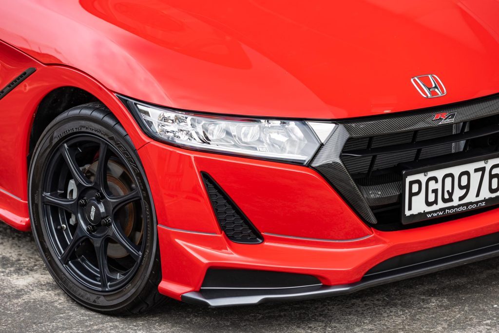 Headlight, wheel, and grille details of the Honda S660 Mugen RA