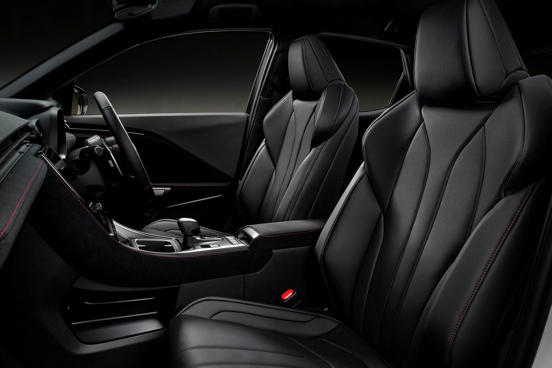 Interior features sports seats and pedals; craftsmanship comes gratis.