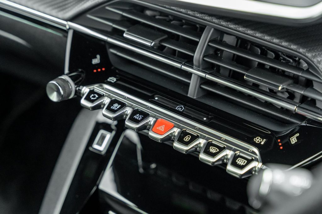 2024 Peugeot 208 GT Hybrid AC control buttons