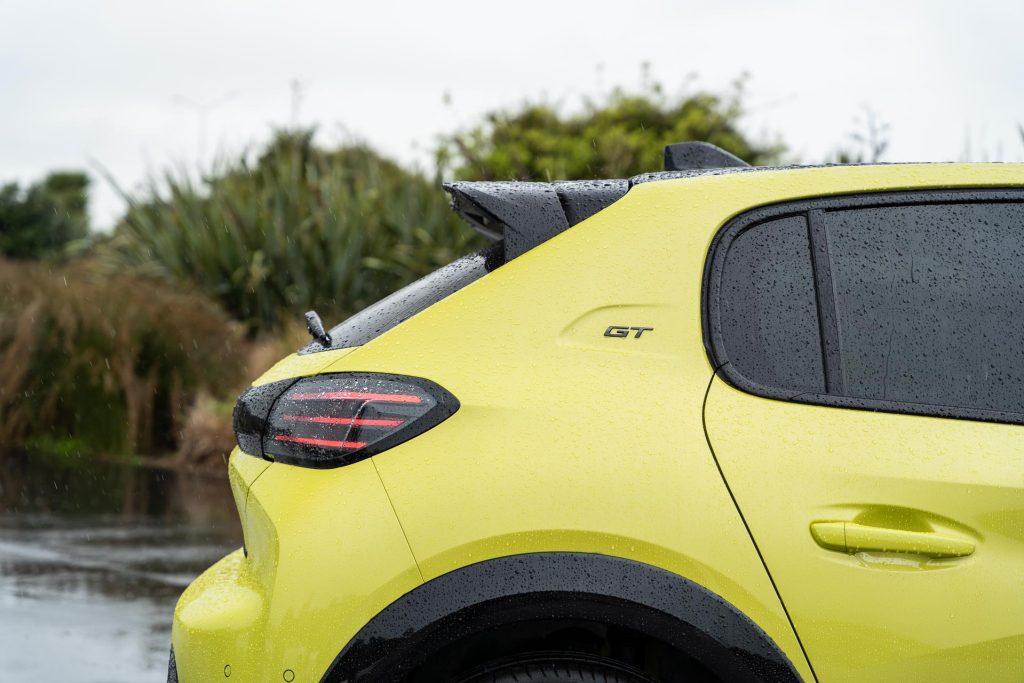 GT badge and side profile of tail lights and wing on the 2024 Peugeot 208 GT