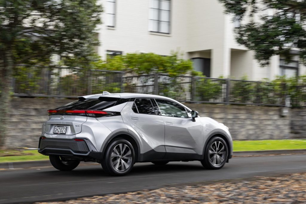 Panning rear shot of the 2024 Toyota C-HR GXL Hybrid