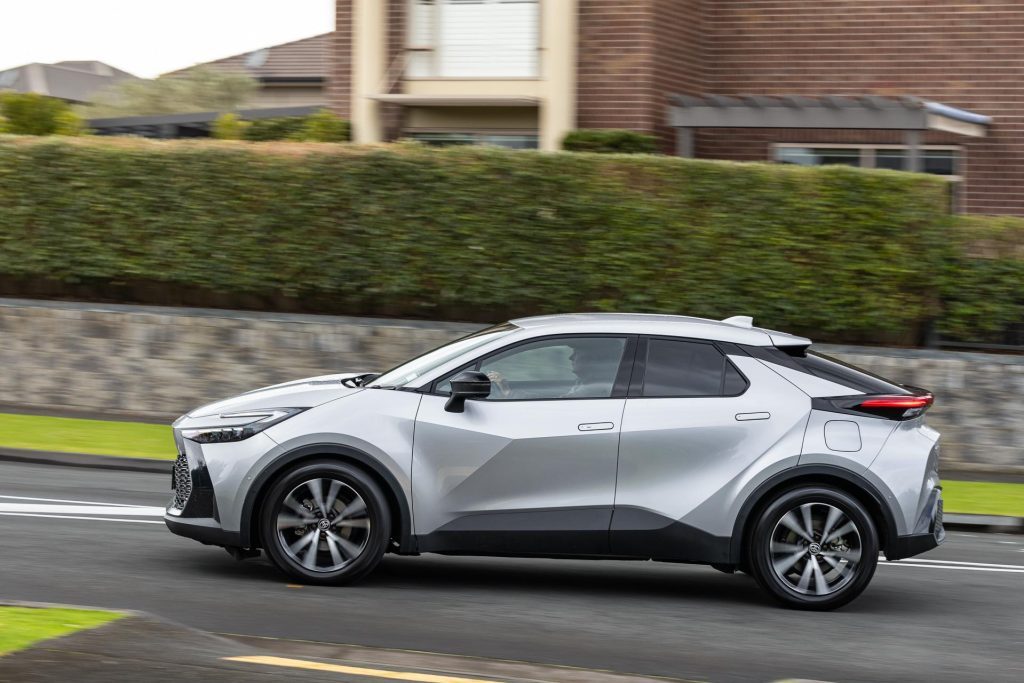 Side panning shot of the 2024 Toyota C-HR GXL Hybrid